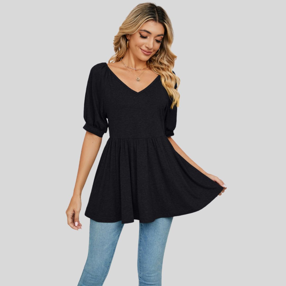 Wide flared peplum top with V-neckline