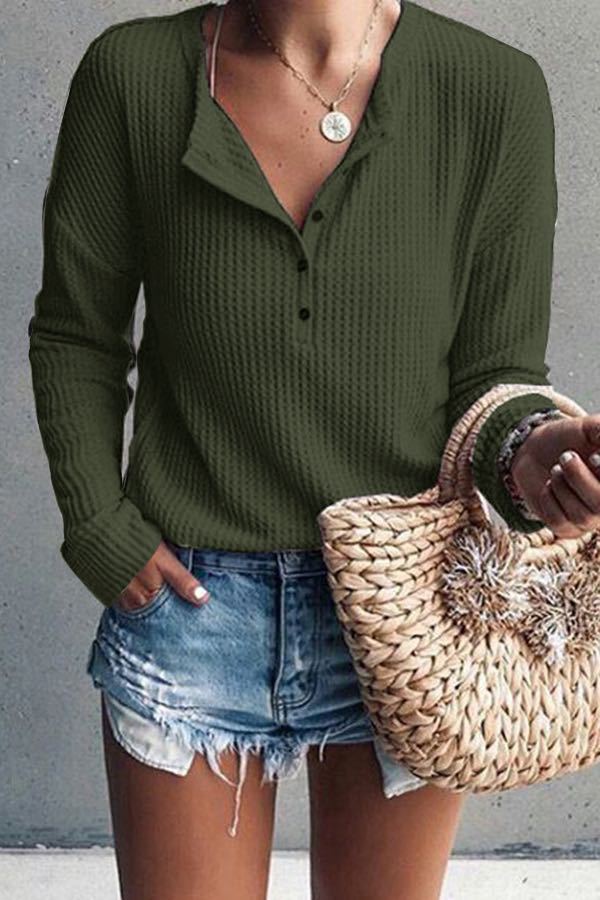 Button-up blouse with V-neck and long sleeves