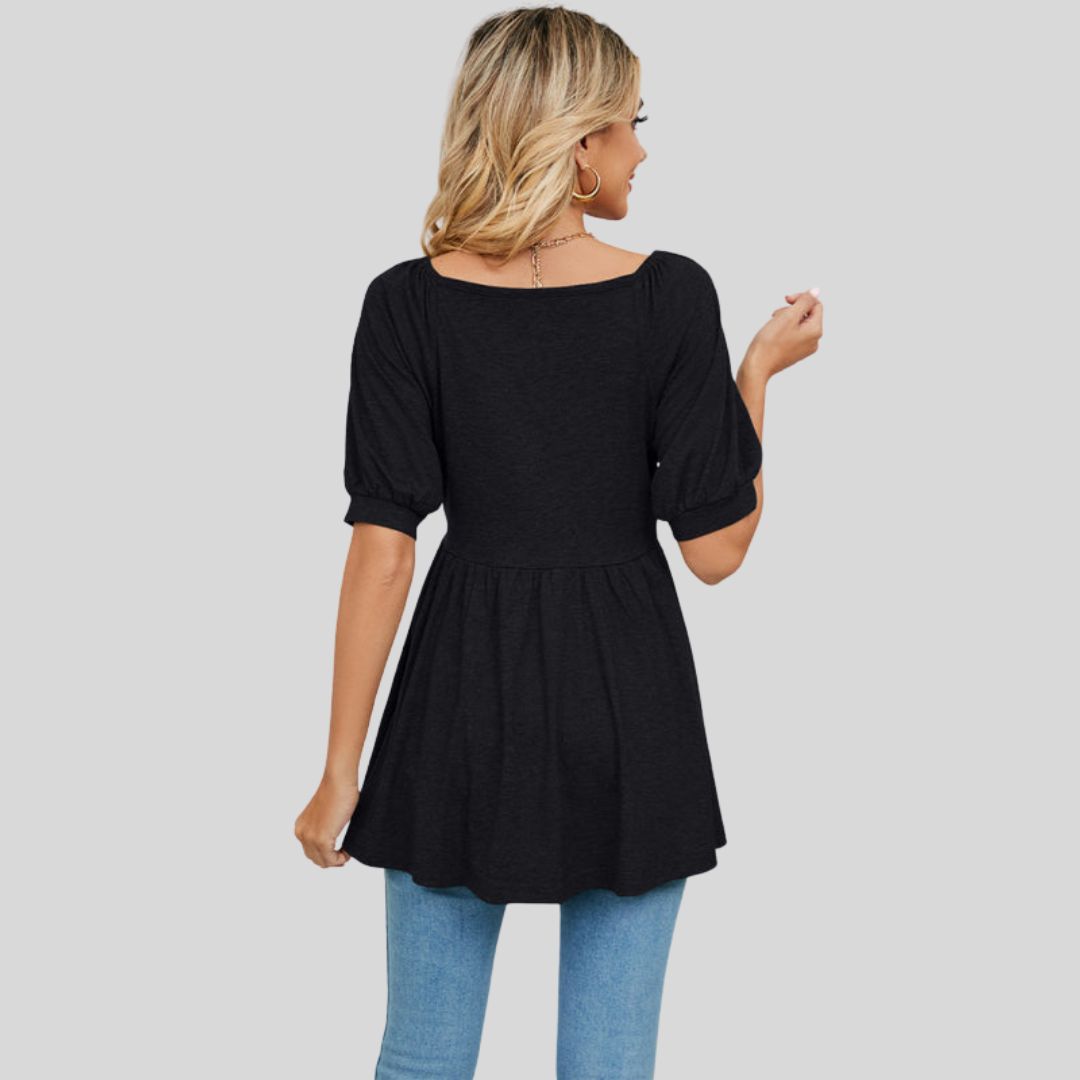 Wide flared peplum top with V-neckline