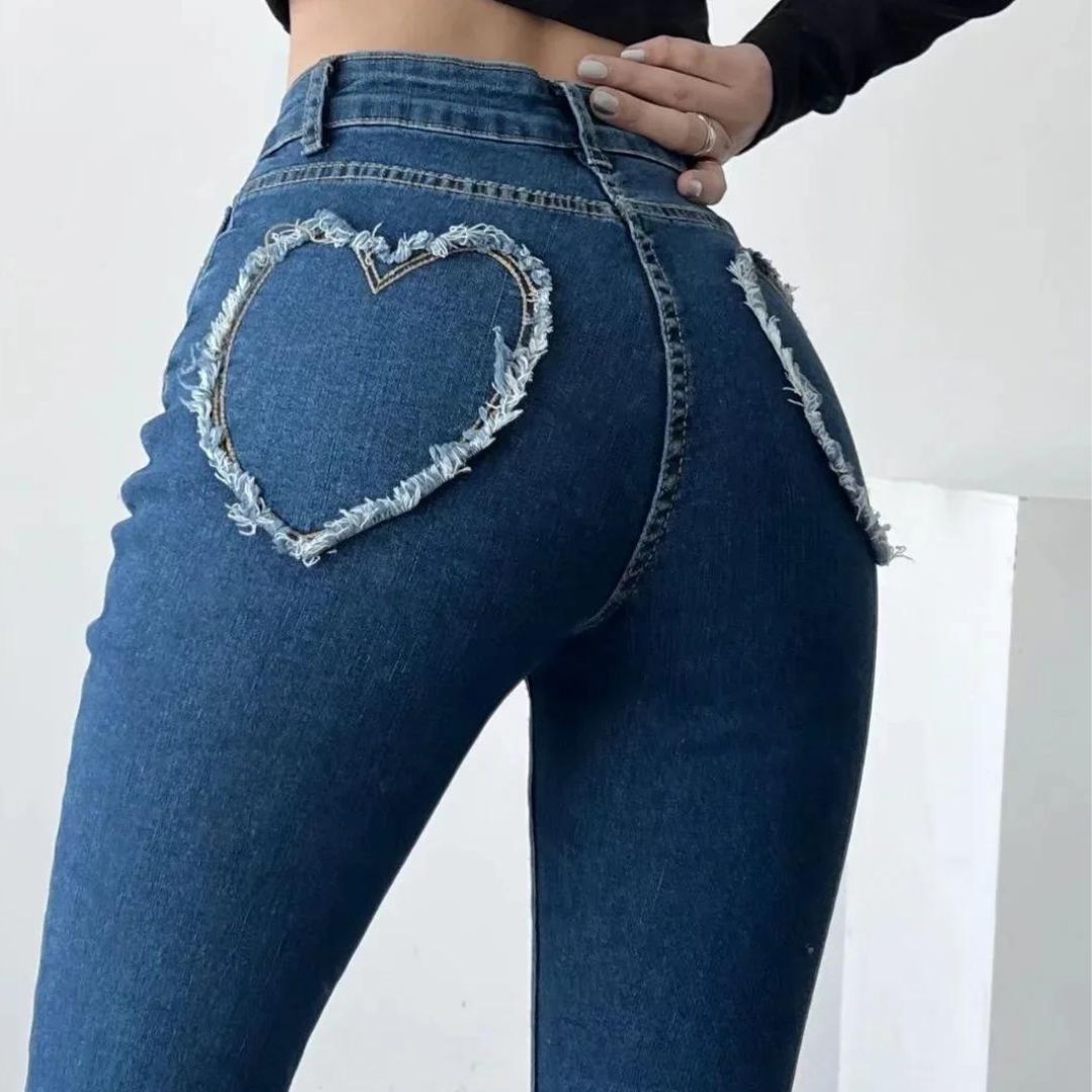 Stylish high-waisted jeans with heart-shaped fringe detail