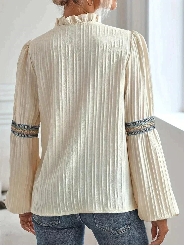 Apricot coloured long sleeve top with print