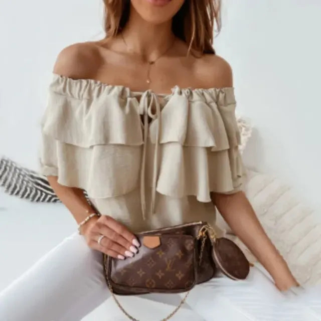 Women's blouse in loose chiffon with off-the-shoulder and flounce edge, elasticated shoulder strap