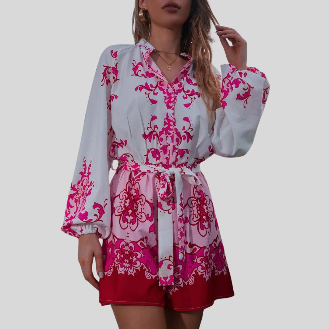 Chic playsuit with floral print and waistband