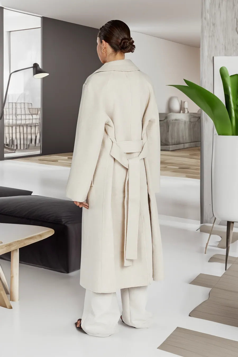 Stylish long women's trench coat in oversize style