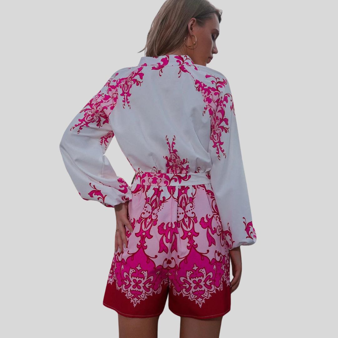 Chic playsuit with floral print and waistband