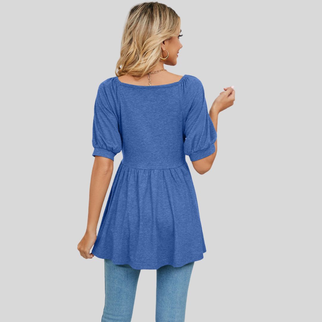 Wide flared peplum top with V-neckline