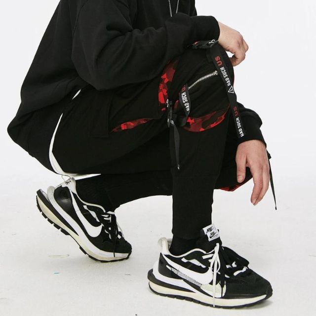 Streetwear jogging trousers with utility straps