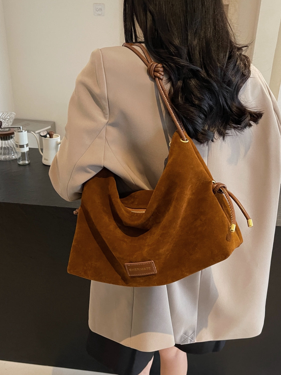 Large handbag in suede