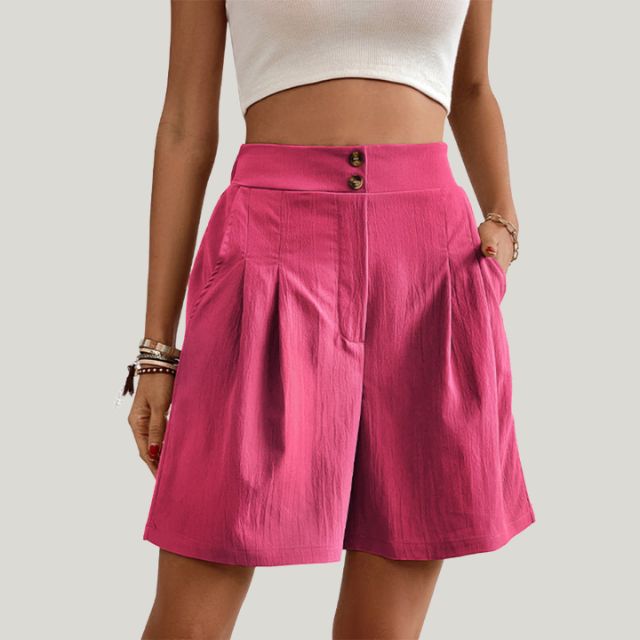 Pleated A-line skirt with button detail