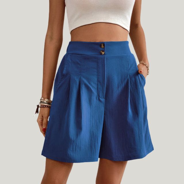 Pleated A-line skirt with button detail