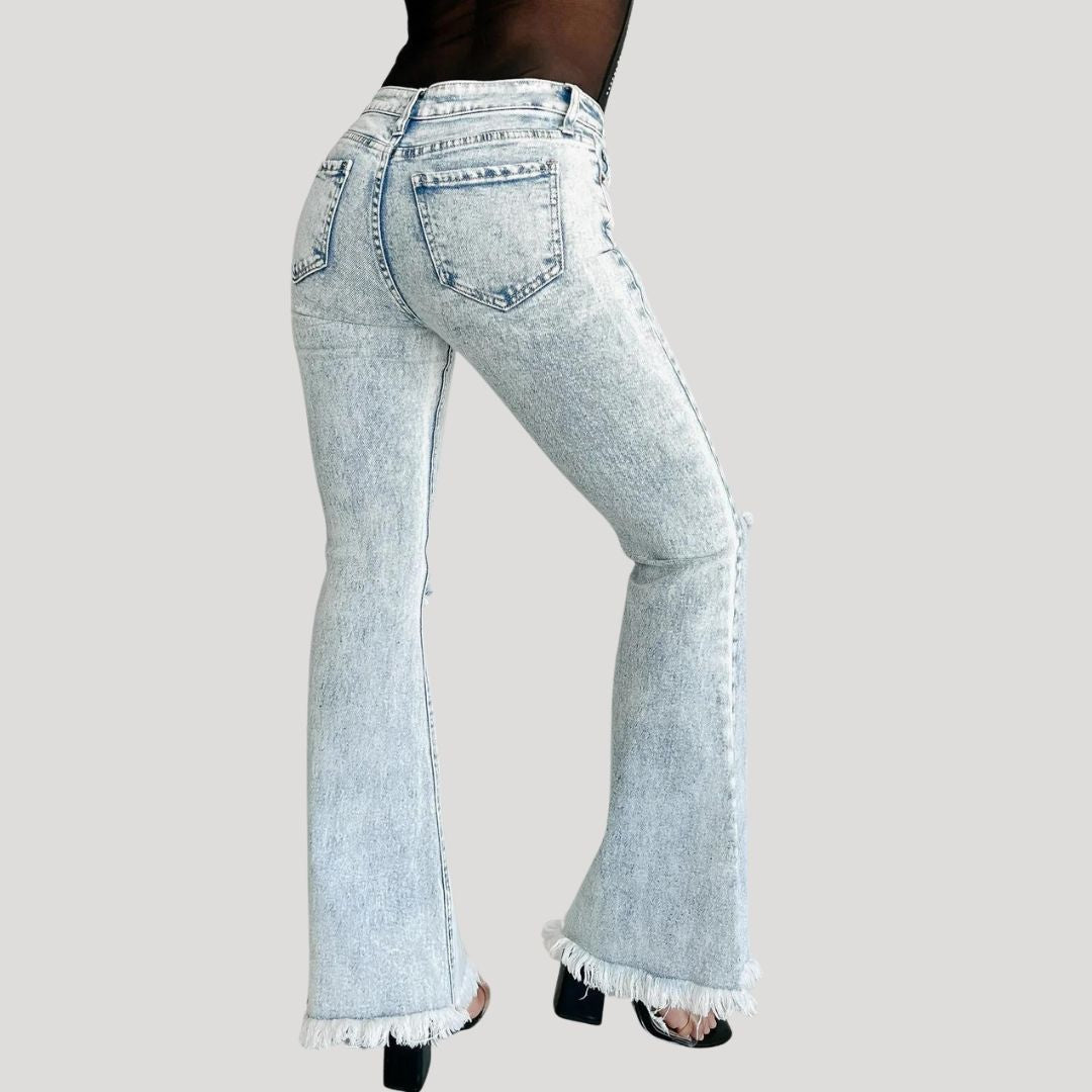 Flared jeans with rips