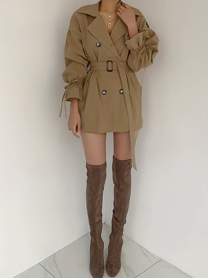 Mid-length, double-breasted trench coat with collar and belt