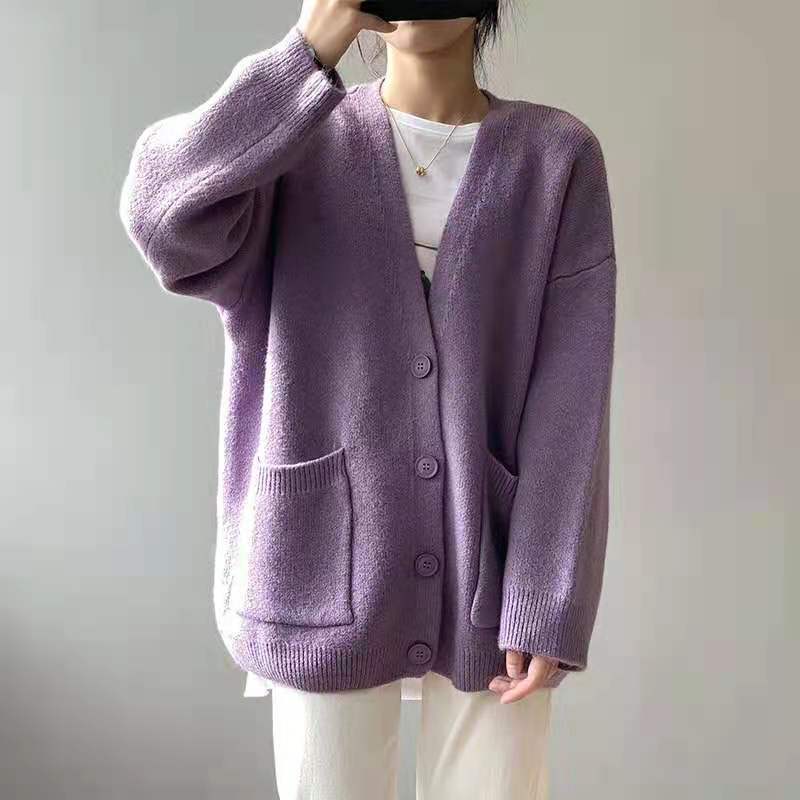 Women's long knit V-neck sweater with oversized buttons