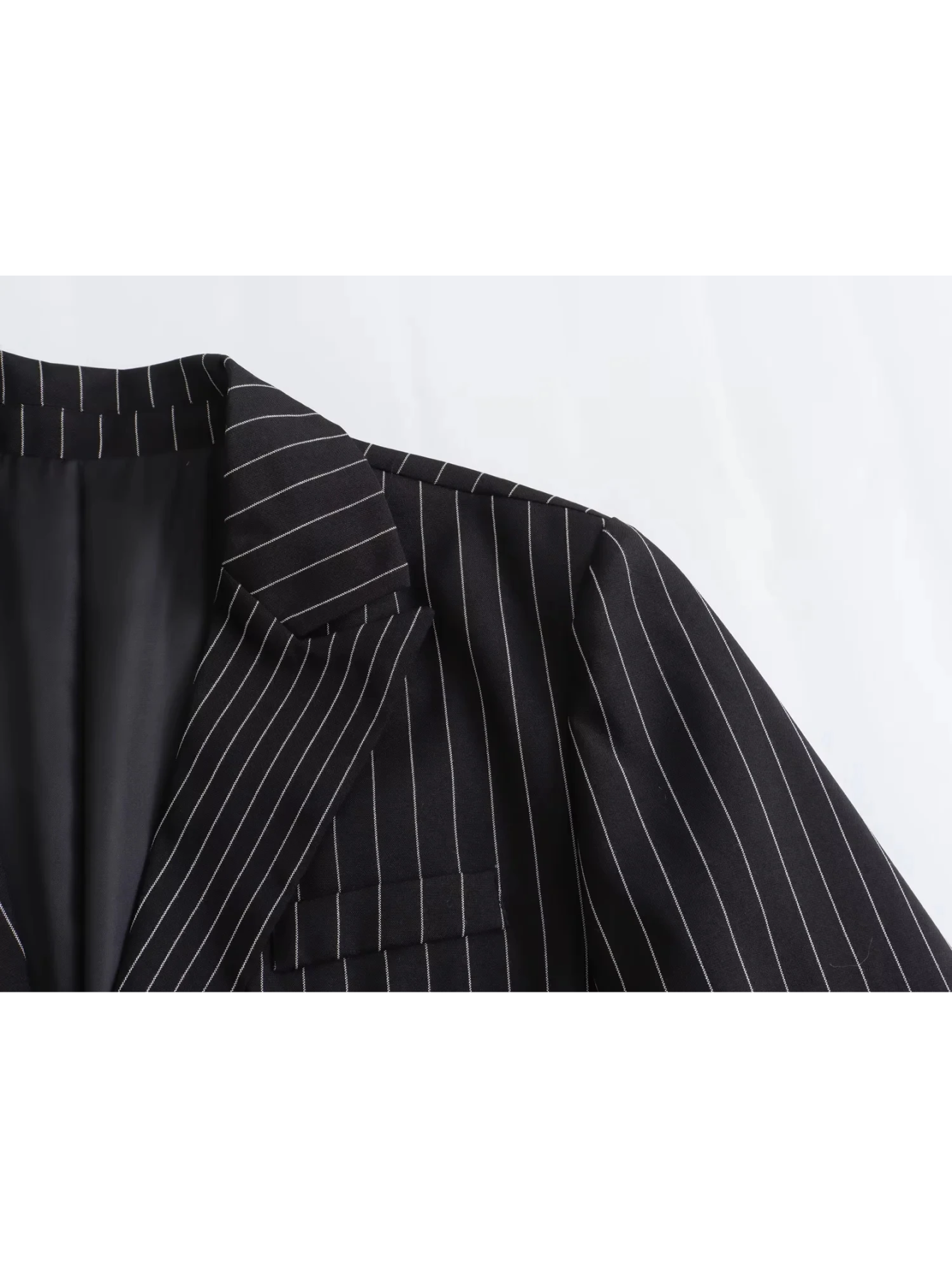 Women's striped blazer with ankle button fastening