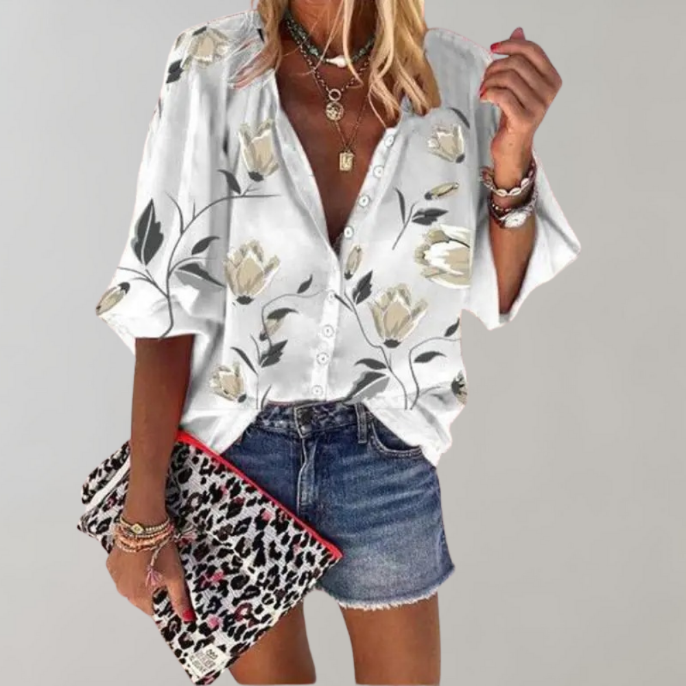 Summery women's blouse with floral pattern