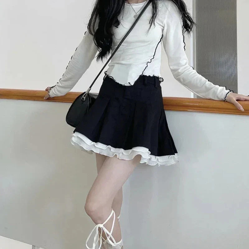 Dainty pleated skirt in Lolita style with lace trim