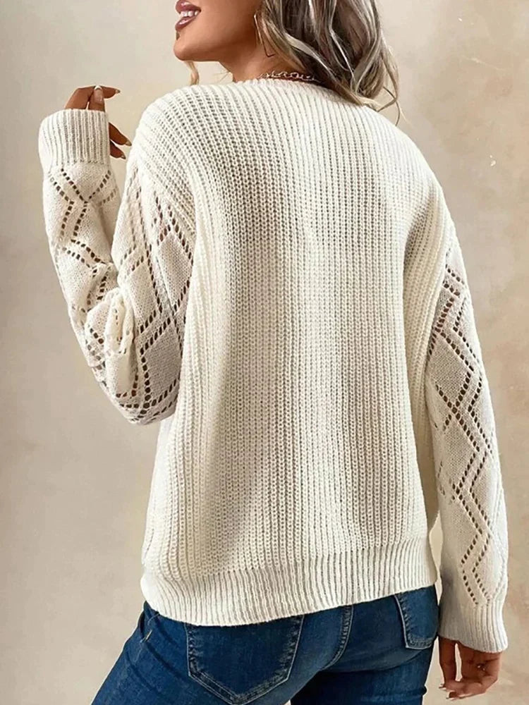 White long-sleeved jumper with V-neck and lace trim