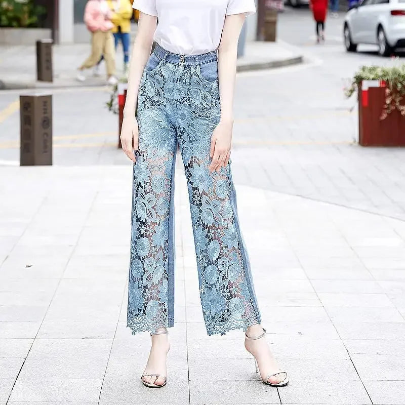 High-waisted jeans with lace patchwork