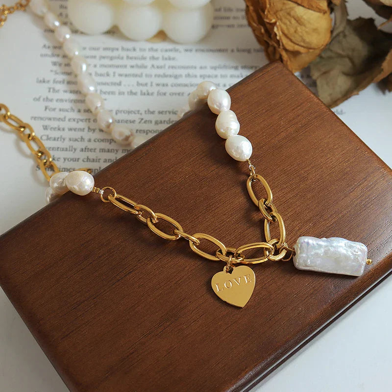 Pearl accent necklace with love pendant