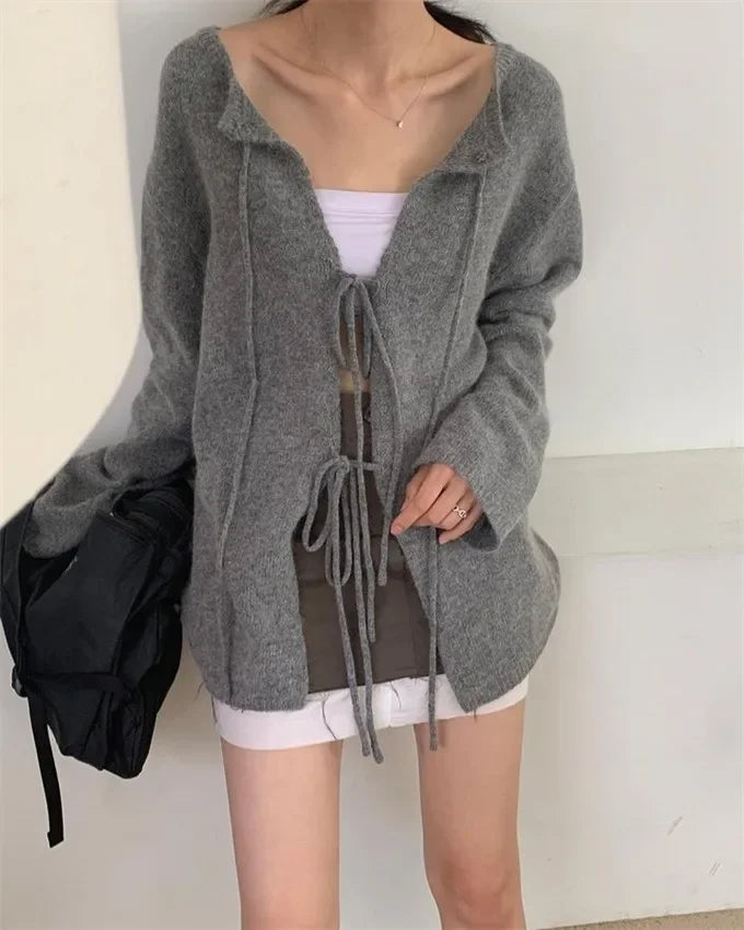 Grey cardigan with hemstitching and lacing