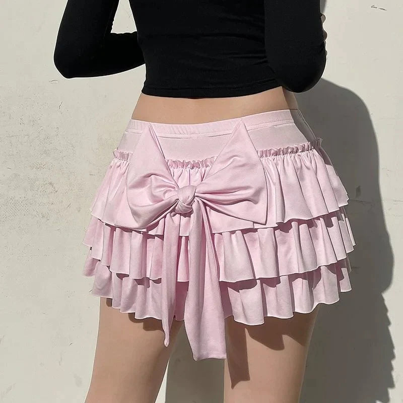 Shorts with ruffled hem and satin bow detail