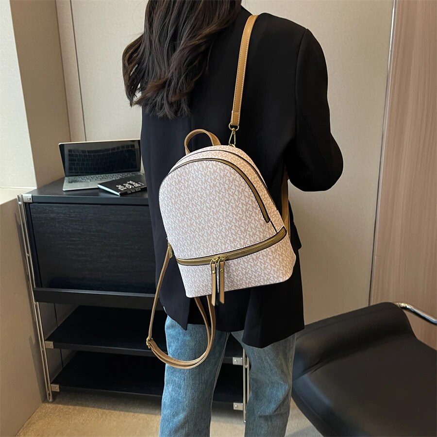 Structured backpack with front zip pocket