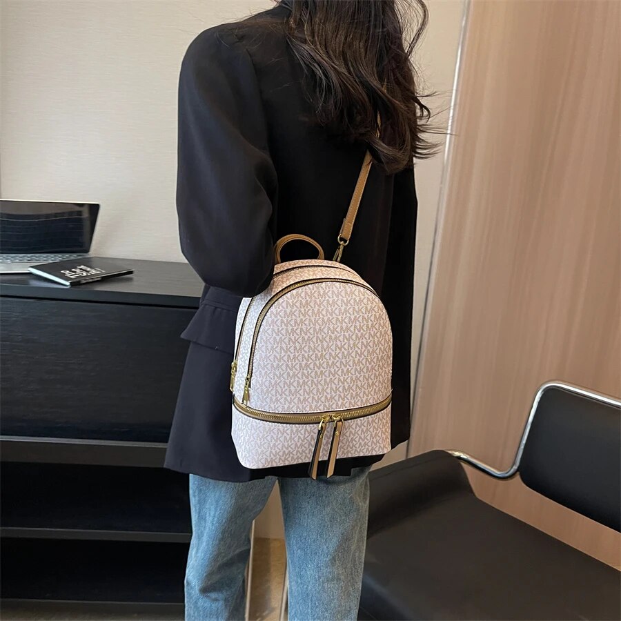 Structured backpack with front zip pocket