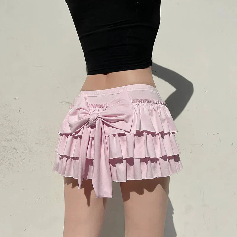 Shorts with ruffled hem and satin bow detail