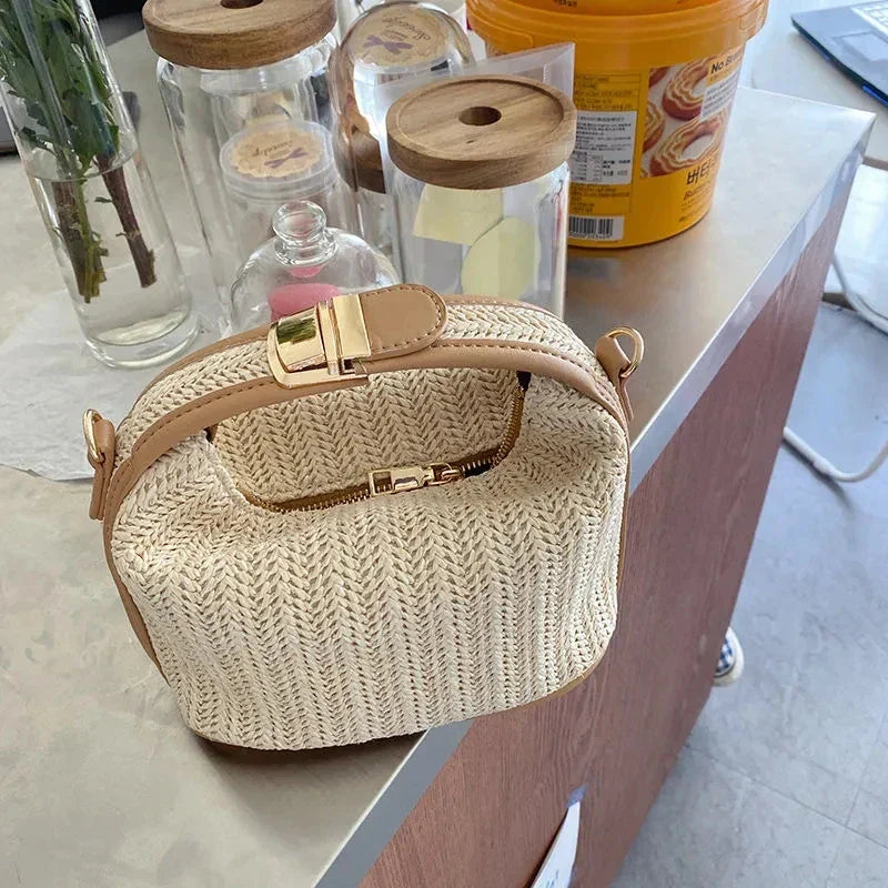 Ladies boho style knitted straw crossbody bag bucket design with zip fastening