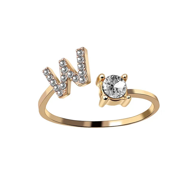 Personalised initial ring with solitaire diamond