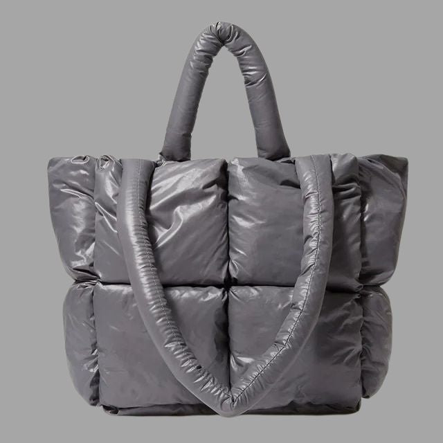 Metallic puffer carrier bag with ruffled design