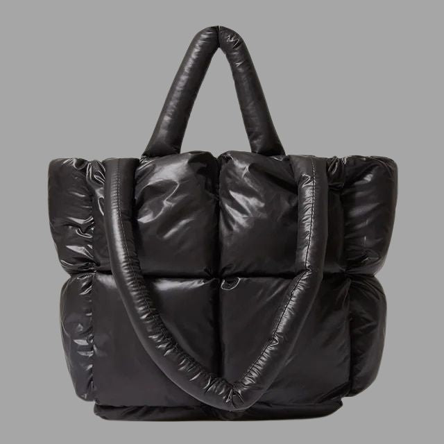 Metallic puffer carrier bag with ruffled design