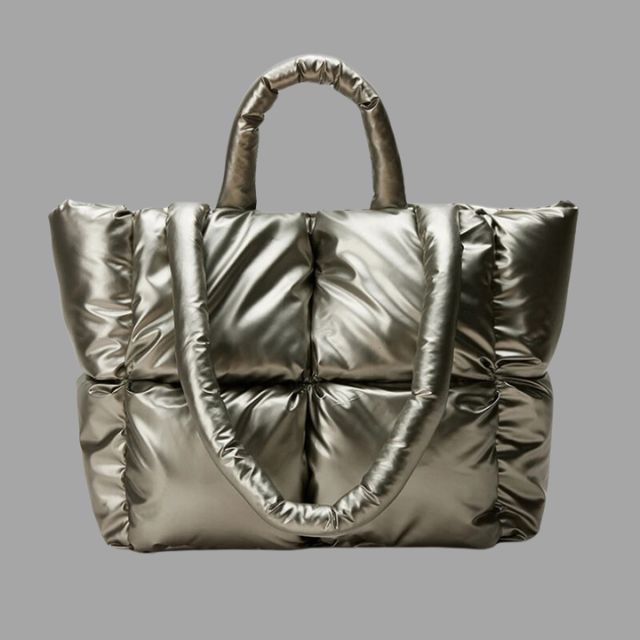 Metallic puffer carrier bag with ruffled design