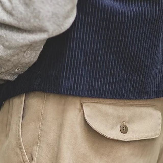 Trousers with pleated front