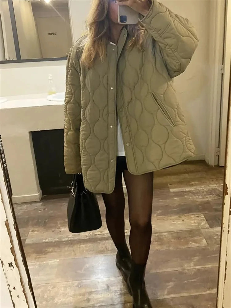 Oversized quilted jacket with press studs