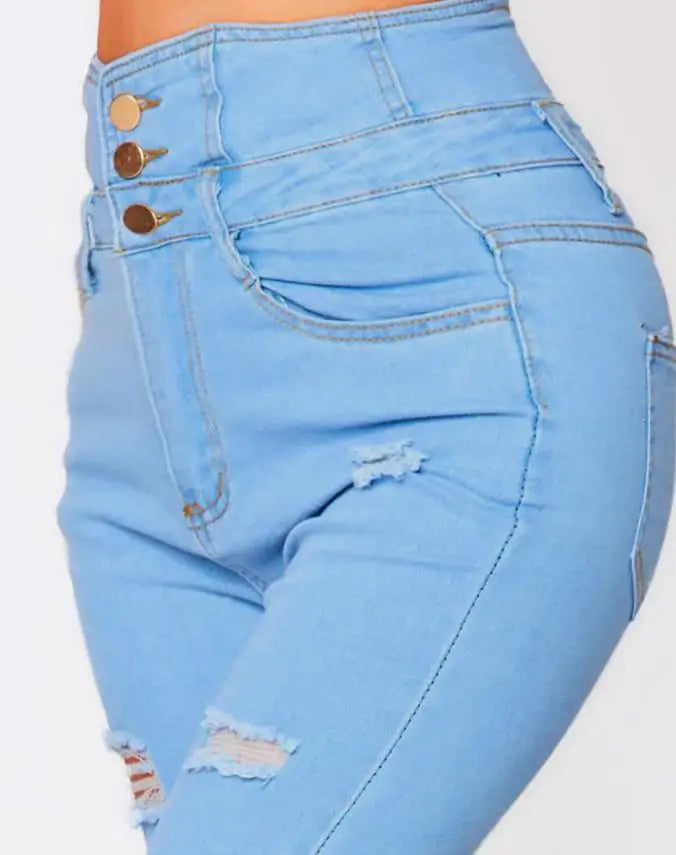 Fashionable skinny jeans with a high waist, stretch and destroyed effects