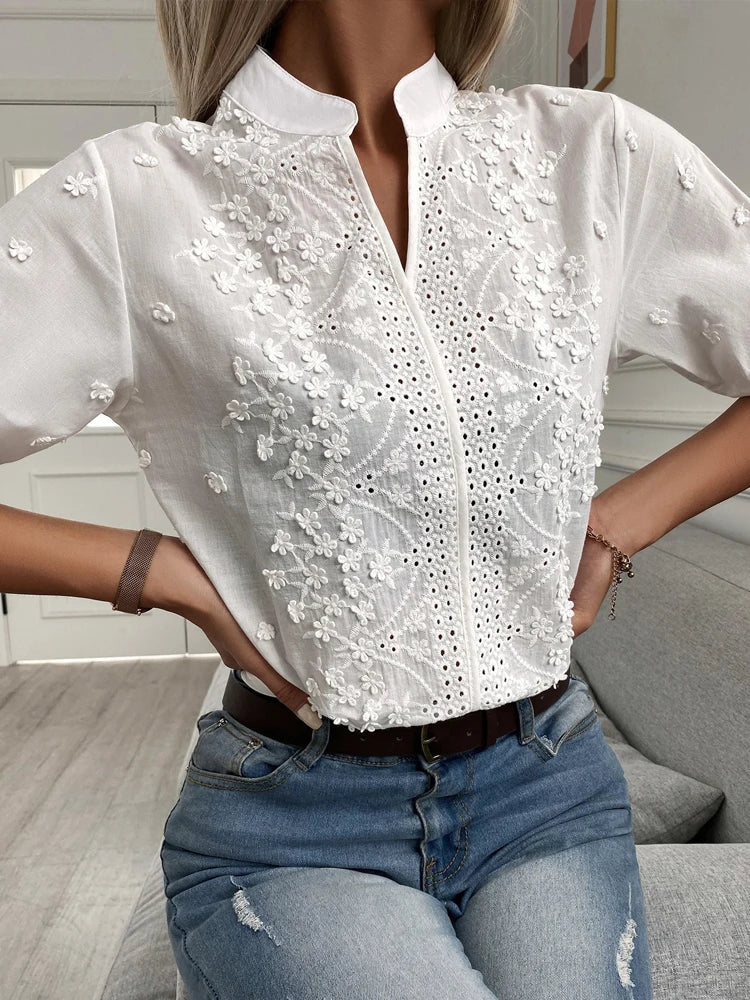 Summery blouse with floral embroidery and lace