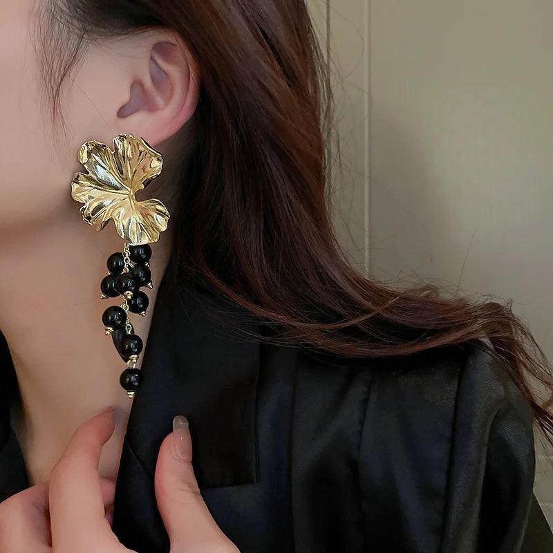 Elegant floral statement earrings with pearl cascade