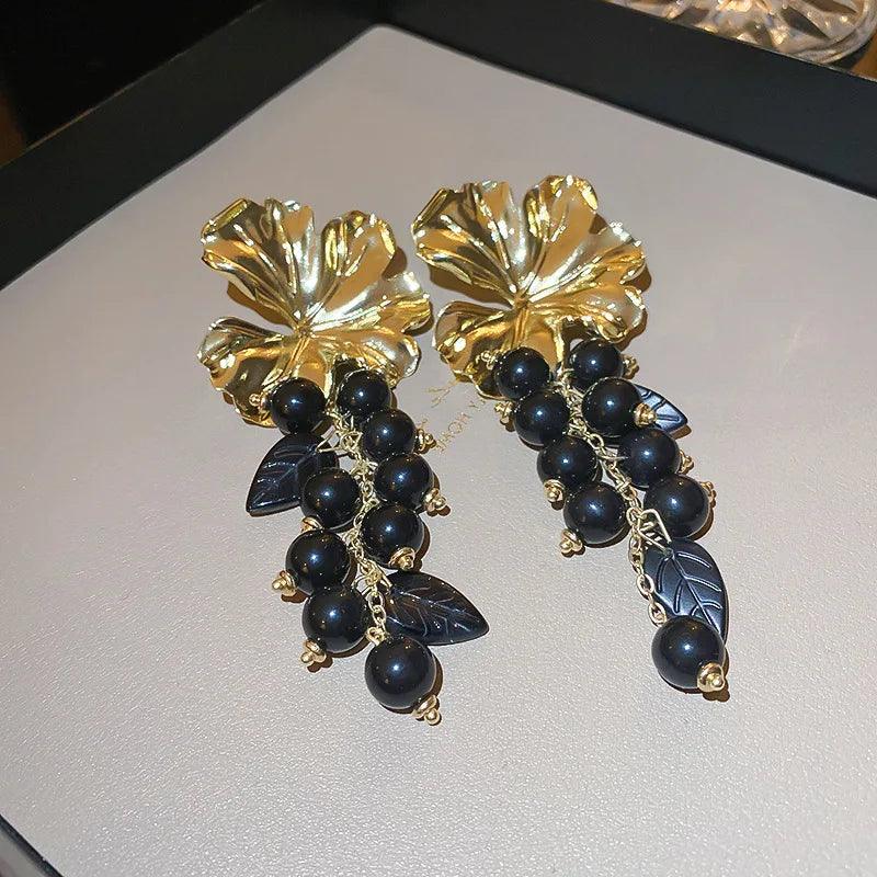 Elegant floral statement earrings with pearl cascade