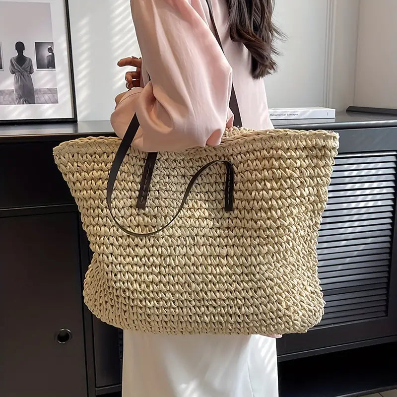 Woven carrier bag with leather straps