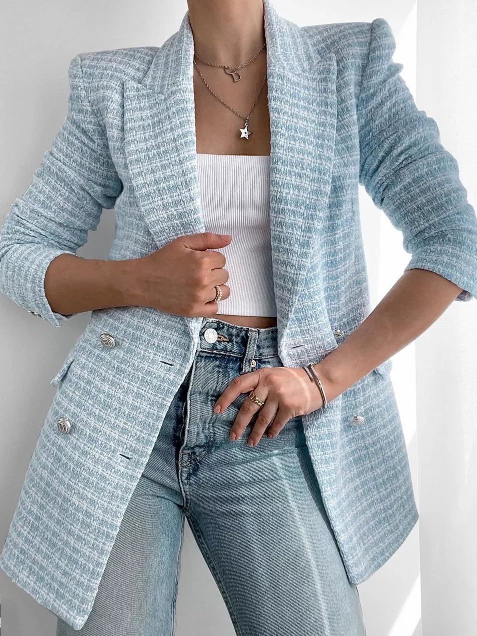 Fashionably cut ladies' blazer in light blue