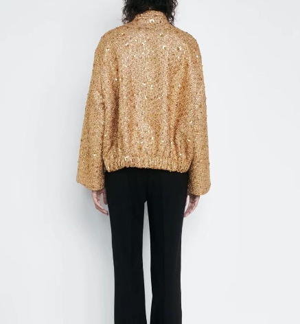 Elegant oversize coat with golden glitter pieces