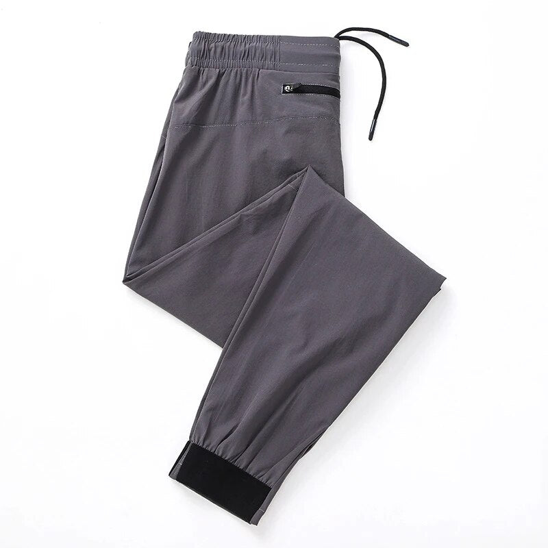 Elastic sports trousers for men