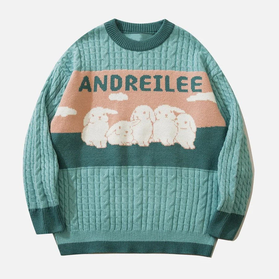 Cable knit jumper with pastel cloud motif