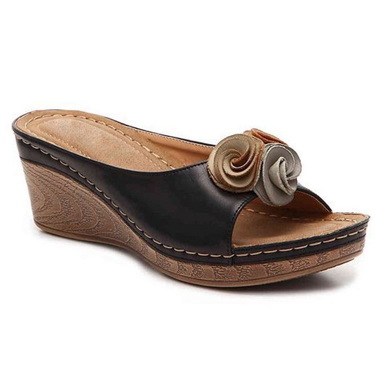 Comfortable wedge sandals in solid leather with flower